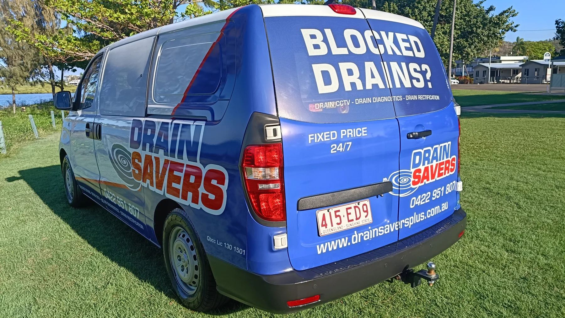 The blue and red Drain Savers service van, equipped for drain clearing and diagnostics